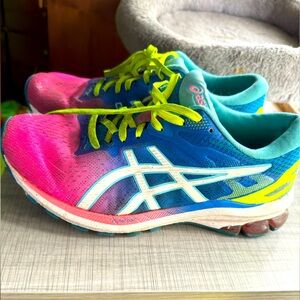 Well worn ASICS running shoes